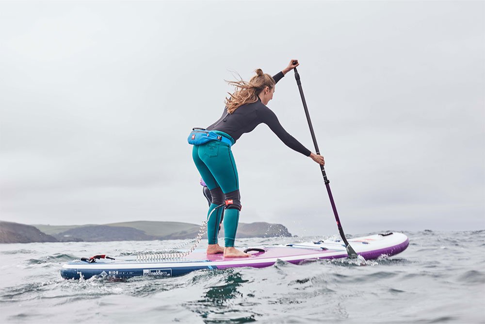 Woman paddling Red Original purple MSL inflatable paddle board